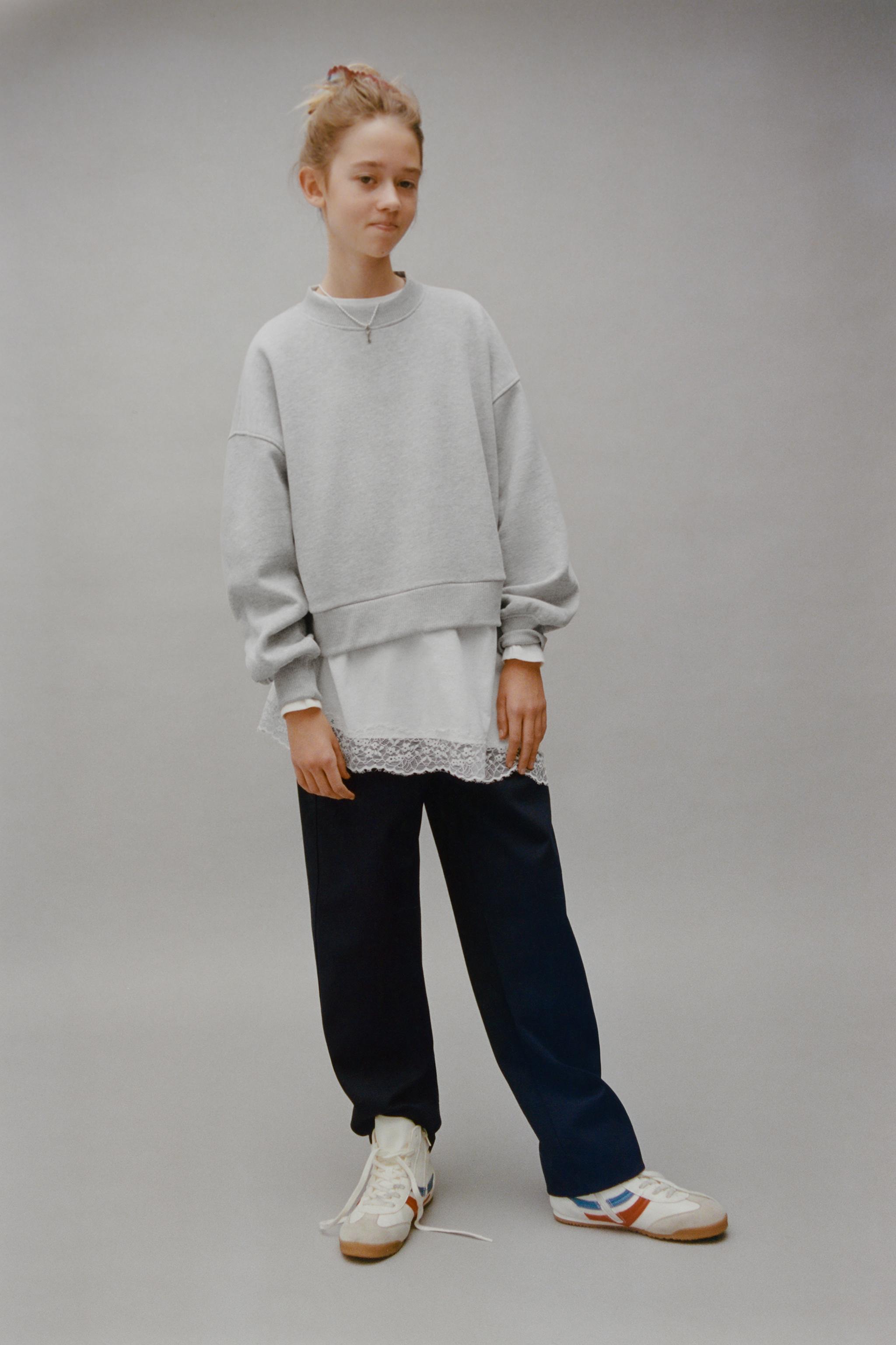 DOUBLE HEM LACE SWEATSHIRT